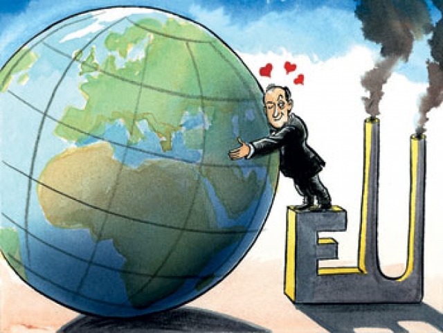 EU Climate Plans - embracing the globe standing on an industrial facility with smoking chimneys